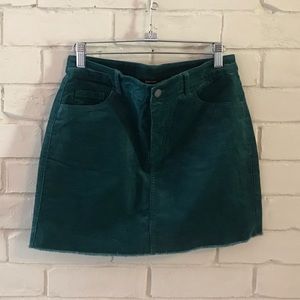 Teal corduroy mini skirt with raw hem, size medium